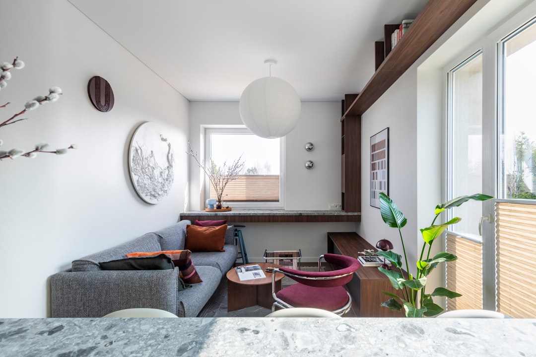 Interior decorating for small apartments with soft light, slim furniture, and calm neutral layers